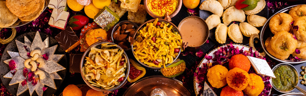 Indian sweets and savoury snacks laid out at Shayona